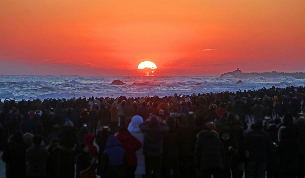 PHOTO: A huge crowd watches the New Years Day sunrise on Masangsang Beach in Donghae, east of Seoul, South Korea, Jan. 1, 2018.