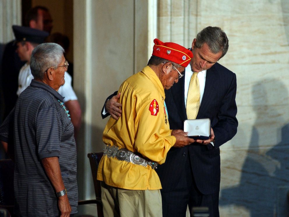   PHOTO: President George W. Bush presents the gold Medal to John Brown, Jr., Navajo Code Talker, during the Gold Medal Ceremony at the Capitol in Washington, DC 