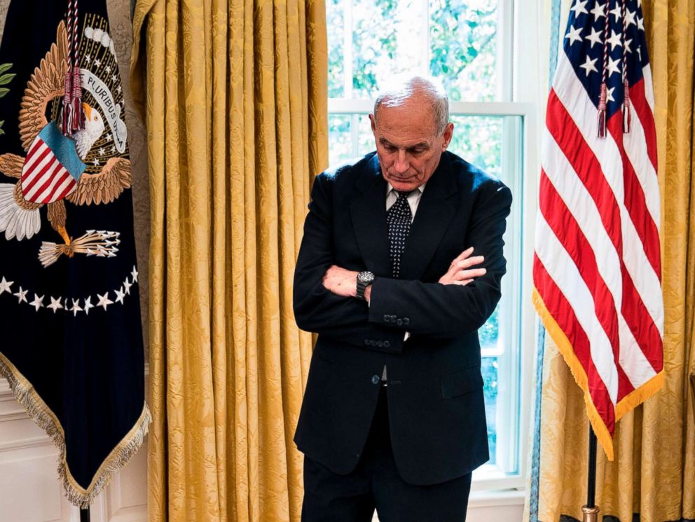 PHOTOGRAPHY: White House Chief of Staff John Kelly waits while Puerto Rico Governor Ricardo Rosselló and President Donald Trump make statements to the press before a meeting at the White House Oval Office , October 19, 2017.