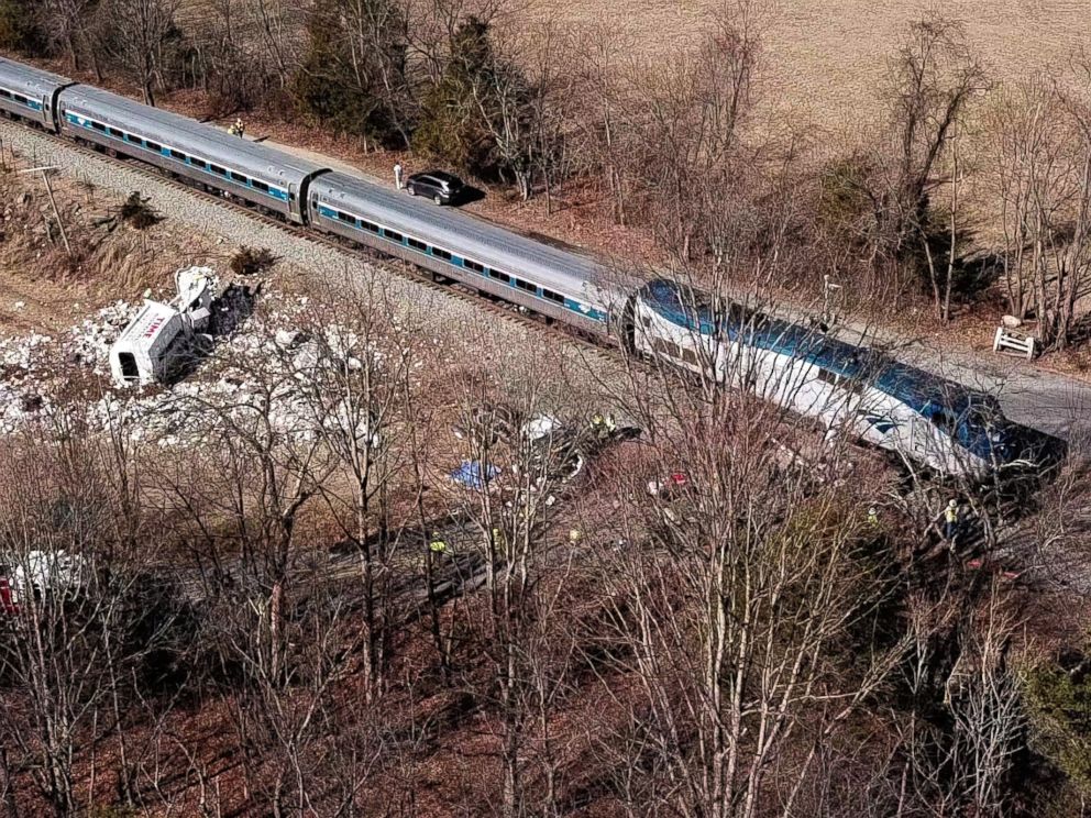 PHOTO: The wreckage of a garbage truck lies beside an Amtrak passenger train after a collision in Crozet, Va., Jan. 31, 2018.