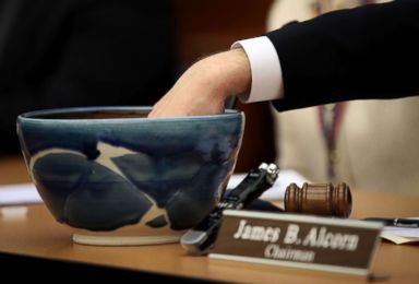 PHOTO: Strips of paper are removed from a bowl to decide a tied race between the two candidates during a meeting of the Virginia State Board of Elections on January 4, 2018 in Richmond, Virginia.