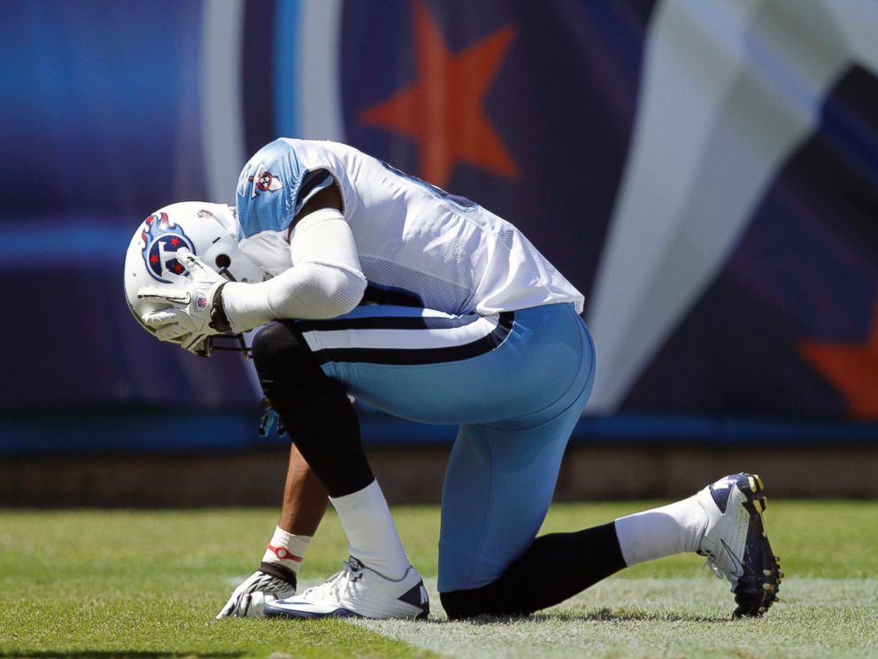 PHOTO: Nate Washington #85 of the Tennessee Titans kneels down after catching a touchdown pass in the first half against the Oakland Raiders during the NFL season opener at LP Field, Sept. 12, 2010, in Nashville, Tenn.