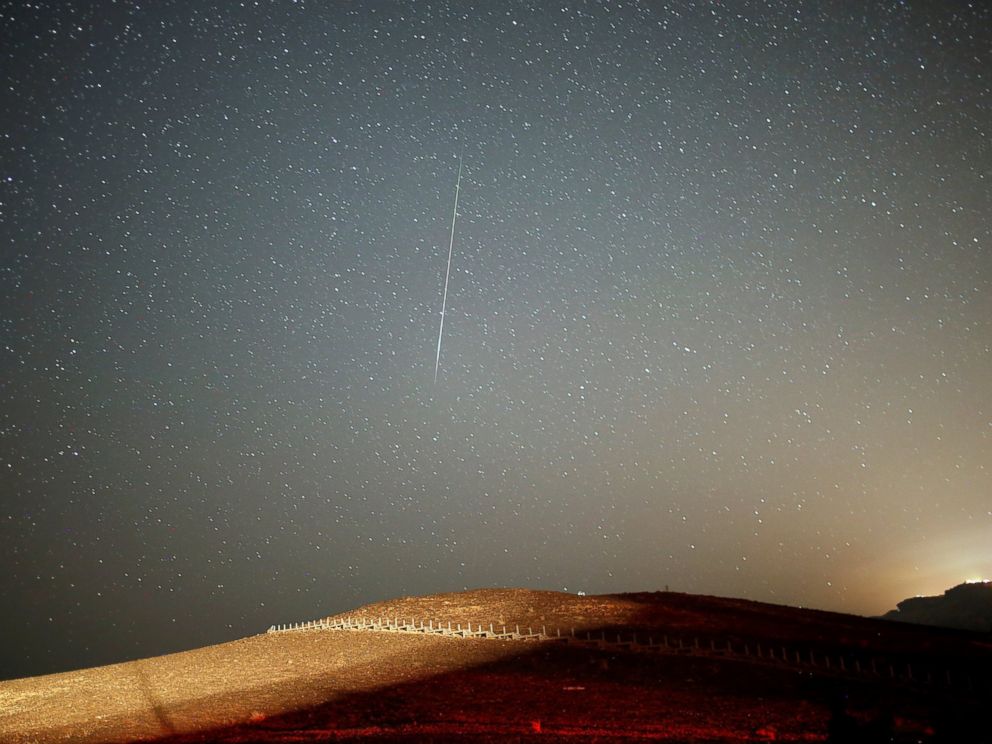 Perseid Meteor Shower Peak Creates Cosmic Display of Light Against ...