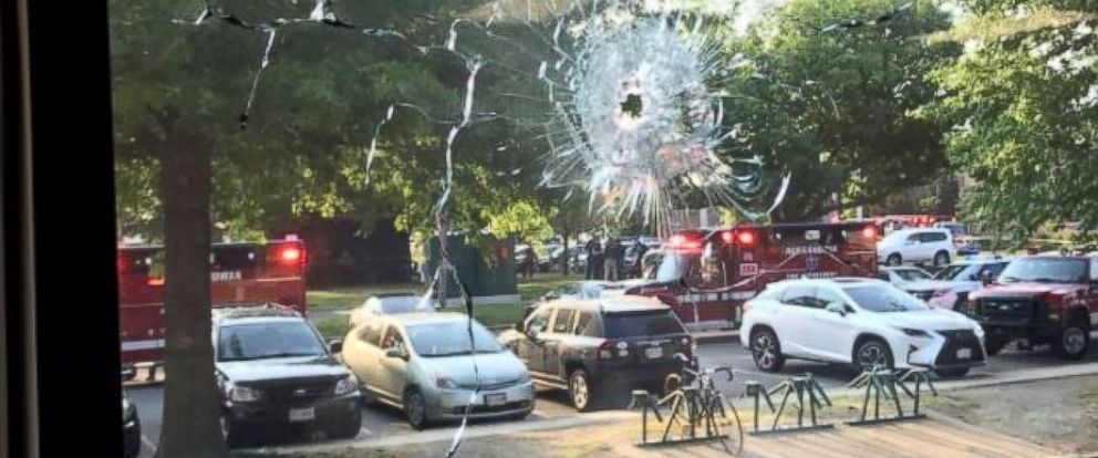 PHOTO: A shattered window near the scene where shots were fired in Alexandria, Va. where members of congress were gathered.