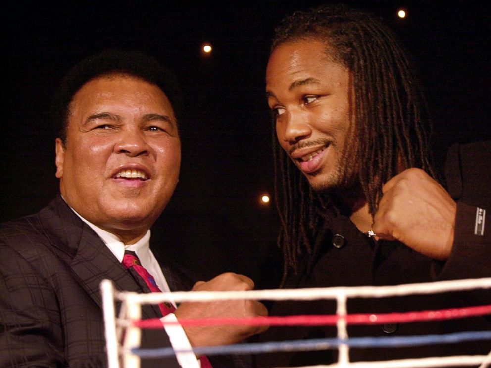 PHOTO: Former Heavyweight Champion Muhammad Ali joins then Heavyweight Champion Lennox Lewis at an event in London, Jan. 15, 2001.