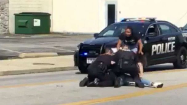 Police officer is on paid leave after 'violent struggle' during arrest ...