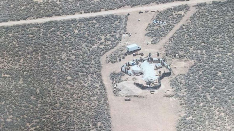 11 children rescued from filthy compound with little food or water