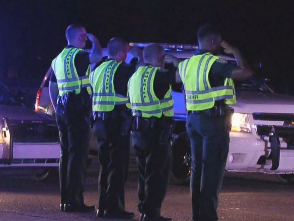 PHOTO: Deputies from the East Baton Rouge Sheriffs Office salute their fallen colleague who was killed in the line of duty on March 18, 2017.