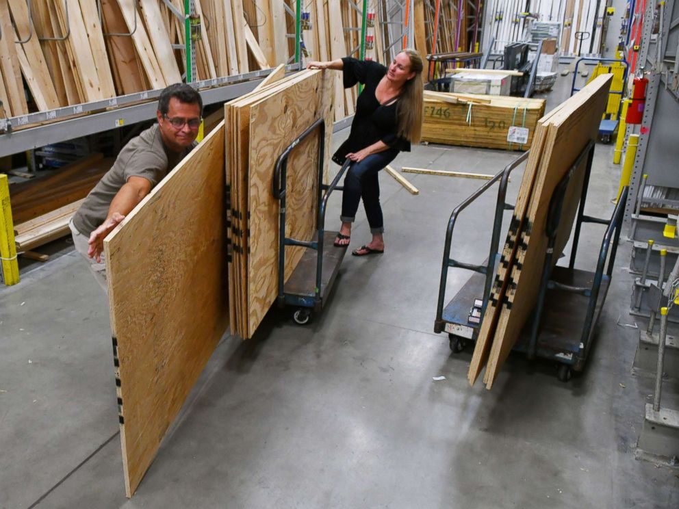 PHOTO: Wes and Davina Hardin of Palm Bay are buying plywood and other hurricane supplies in preparation for Hurricane Irma on Sept. 4, 2017, at the Melbourne Lowes Home Improvement Store on Minton Road, Fla. 