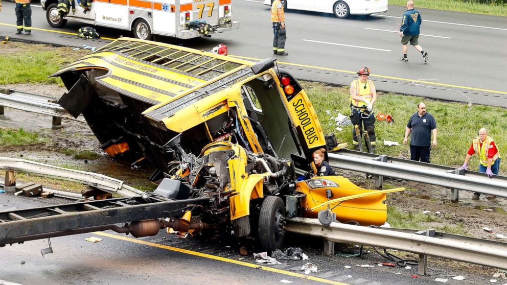 Deaths reported after school bus full of 5th-graders slams off highway