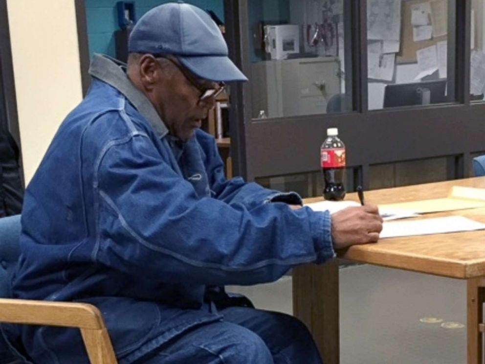 PHOTO: O.J. Simpson signs paperwork before his release from Lovelock Correctional Center Sept. 30, 2017 in Lovelock, Nev.