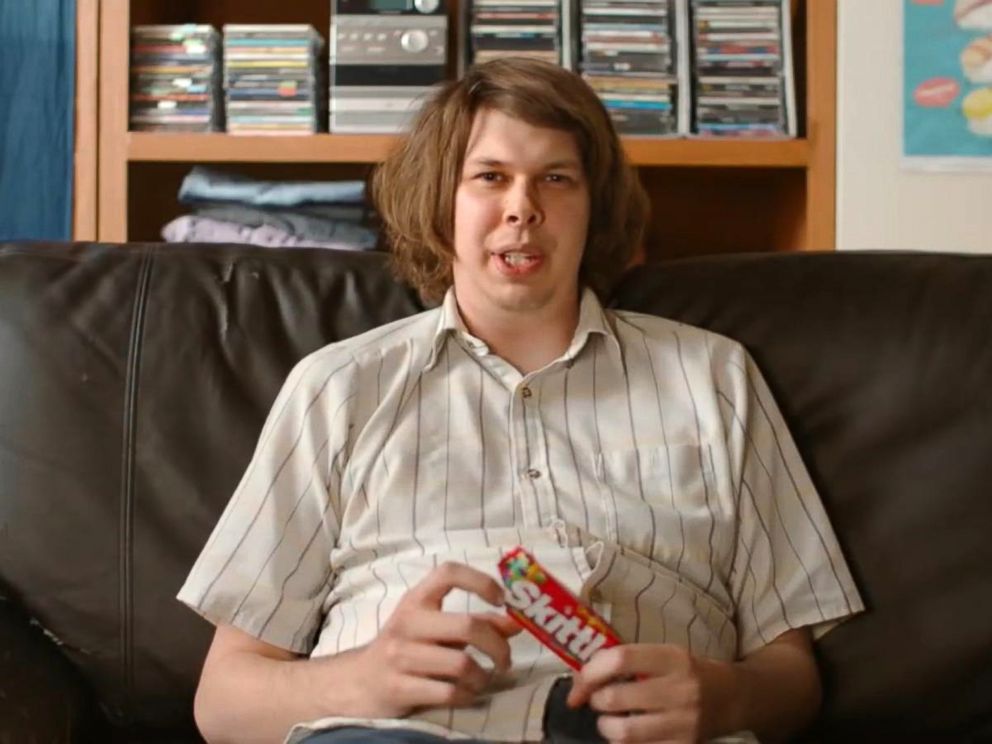 A man eats Skittles in a teaser for the ultra-exclusive Skittles Super Bowl ad. 